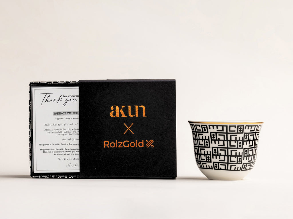 AKUN x RolzGold Essence of Life Saada candle showcasing Arabic geometric design symbolising happiness, presented with collaborative packaging