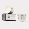 AKUN Scents of Arabia amber candle presented in a silver-toned patterned ceramic cup with signature box