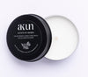AKUN Scents of Arabia jasmine travel tin candle with black lid and white wax, compact floral jasmine-scented candle made in the UAE