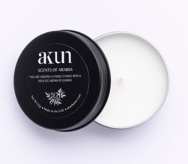 AKUN Scents of Arabia jasmine travel tin candle with black lid and white wax, compact floral jasmine-scented candle made in the UAE
