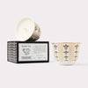 AKUN Scents of Arabia karak tea candle styled as a refined gift with patterned ceramic cup and box