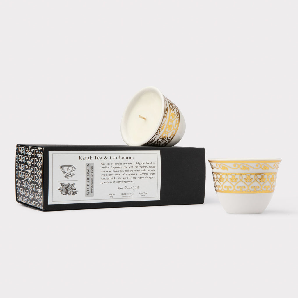 AKUN Scents of Arabia discovery candle set featuring Karak Tea and Cardamom scents in a gold scroll-patterned ceramic cup