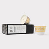 AKUN Scents of Arabia discovery candle set featuring Karak Tea and Cardamom scents in a gold scroll-patterned ceramic cup