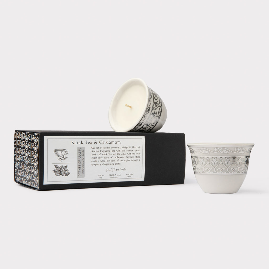 AKUN Scents of Arabia discovery candle set featuring Karak Tea and Cardamom scents in white ceramic cups with an elegant silver arabesque pattern