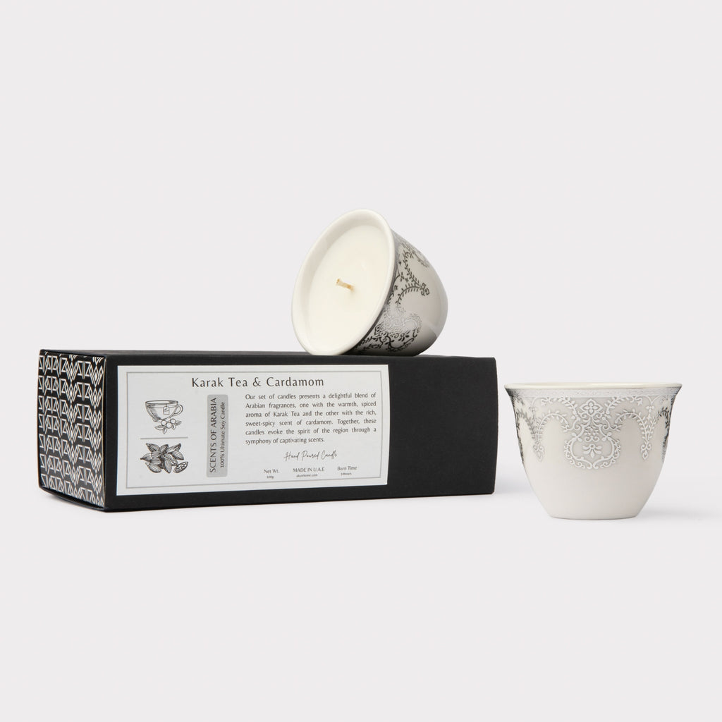 AKUN Scents of Arabia discovery candle set with Karak Tea and Cardamom scents in white ceramic cups featuring a silver floral medallion pattern