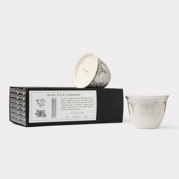 AKUN Scents of Arabia discovery candle set with Karak Tea and Cardamom scents in white ceramic cups featuring a silver floral medallion pattern