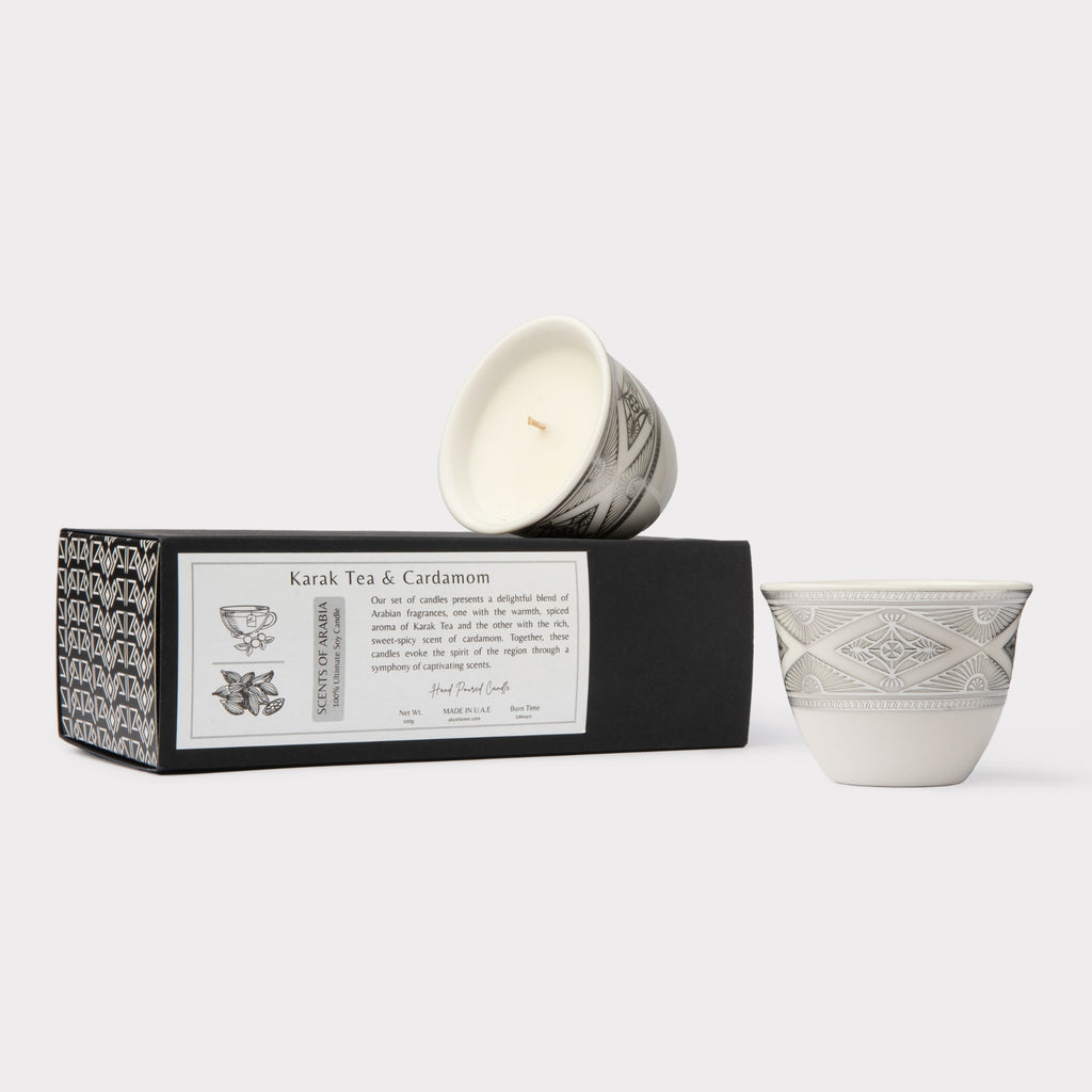 AKUN Scents of Arabia discovery candle set with Karak Tea and Cardamom scents in white ceramic cups featuring a silver geometric motif