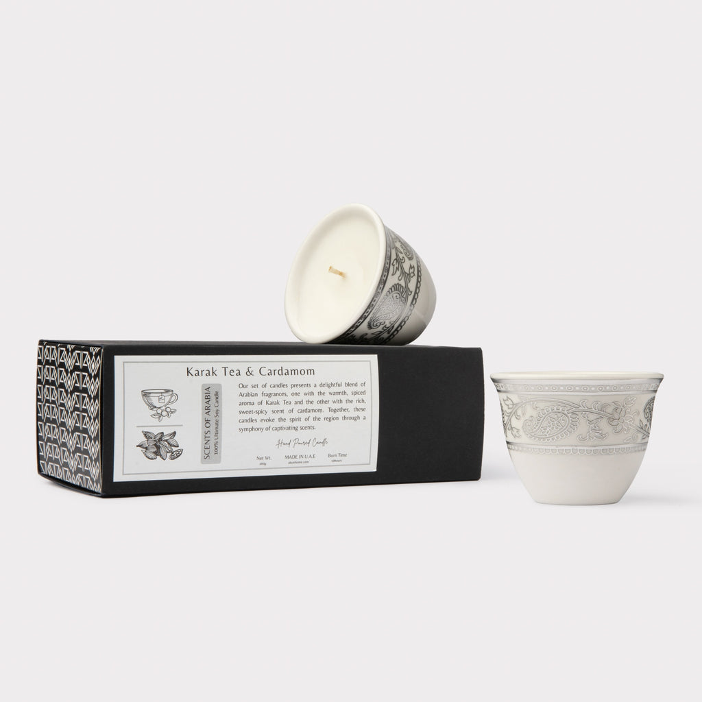 AKUN Scents of Arabia discovery candle set featuring Karak Tea and Cardamom scents in white ceramic cups with an intricate silver ornate pattern
