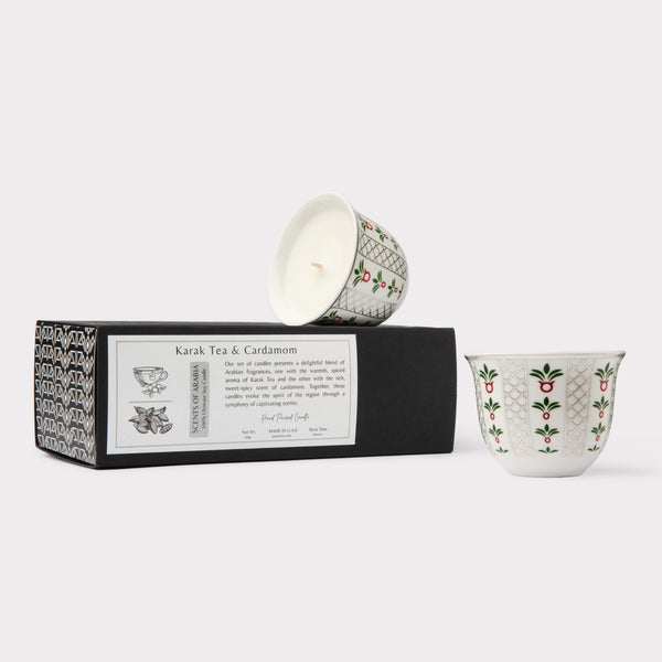 AKUN Scents of Arabia discovery candle set featuring Karak Tea and Cardamom scents in white ceramic cups with an elegant silver pattern