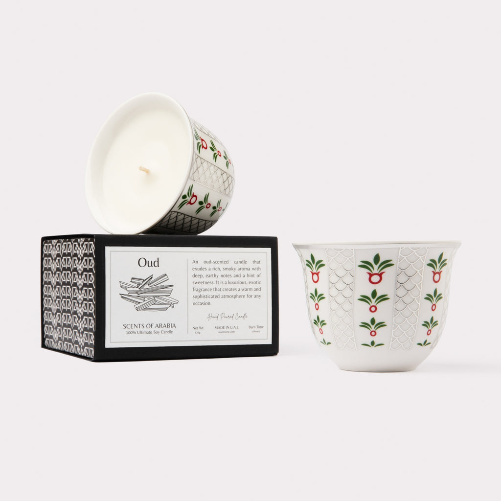 AKUN Scents of Arabia oud candle presented in a silver-toned ceramic cup with traditional patterned detailing