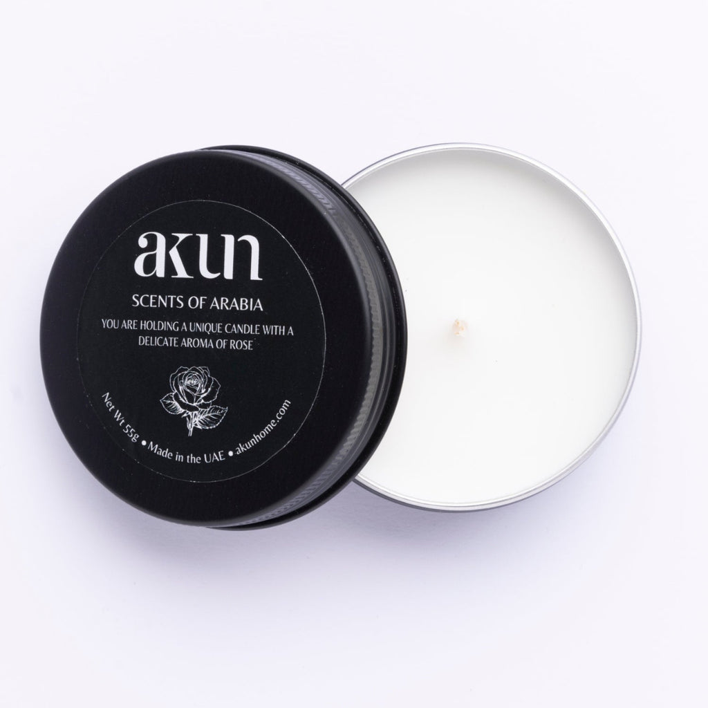AKUN Scents of Arabia rose travel tin candle with black lid and white wax, a delicate rose fragrance inspired by Arabian perfumery
