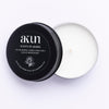 AKUN Scents of Arabia rose travel tin candle with black lid and white wax, a delicate rose fragrance inspired by Arabian perfumery